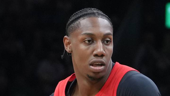 Toronto Raptors forward RJ Barrett dribbles the ball against the Boston Celtics.