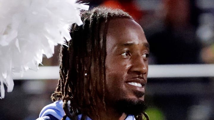 Tennessee Titan's player L'Jarius Sneed stands on the sidelines as the Blackman band takes the field. Tennessee Titan's player L'Jarius Sneed stands on the sidelines as the Blackman band takes the field.