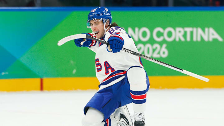 Feb 20, 2026; Milan, Italy; Jack Hughes (86) of the United States celebrates after scoring a goal during the second period against Slovakia in a men's ice hockey semifinal during the Milano Cortina 2026 Olympic Winter Games at Milano Santagiulia Ice Hockey Arena. Mandatory Credit: Geoff Burke-Imagn Images Feb 20, 2026; Milan, Italy; Jack Hughes (86) of the United States celebrates after scoring a goal during the second period against Slovakia in a men's ice hockey semifinal during the Milano Cortina 2026 Olympic Winter Games at Milano Santagiulia Ice Hockey Arena. Mandatory Credit: Geoff Burke-Imagn Images