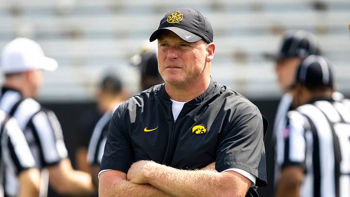 Aug 9, 2025; Iowa offensive line coach George Barnett looks on during the Hawkeyes Kids Day NCAA football open practice at Kinnick Stadium in Iowa City, Iowa. Mandatory Credit: Joseph Cress for the Des Moines Register Aug 9, 2025; Iowa offensive line coach George Barnett looks on during the Hawkeyes Kids Day NCAA football open practice at Kinnick Stadium in Iowa City, Iowa. Mandatory Credit: Joseph Cress for the Des Moines Register