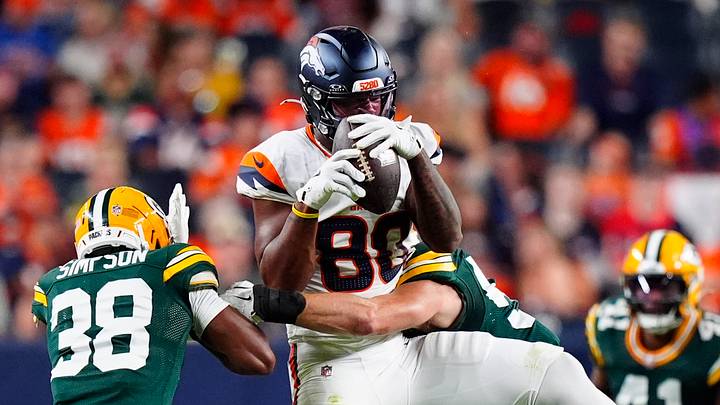 Aug 21, 2026; Denver, Colorado, USA; Denver Broncos tight end Justin Joly (80) pulls in front Green Bay Packers safety Trey Dean (38) in the second half during a preseason game at Empower Field at Mile High. Mandatory Credit: Ron Chenoy-Imagn Images Aug 21, 2026; Denver, Colorado, USA; Denver Broncos tight end Justin Joly (80) pulls in front Green Bay Packers safety Trey Dean (38) in the second half during a preseason game at Empower Field at Mile High. Mandatory Credit: Ron Chenoy-Imagn Images
