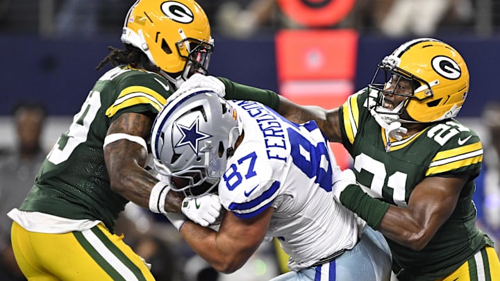 Dallas Cowboys tight end Jake Ferguson (87) catches a pass for a touchdown pass between Xavier McKinney and Nate Hobbs. Dallas Cowboys tight end Jake Ferguson (87) catches a pass for a touchdown pass between Xavier McKinney and Nate Hobbs.