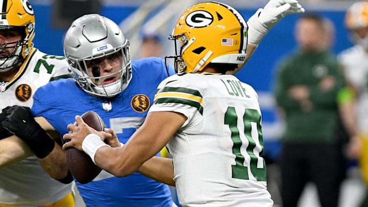 Detroit Lions defensive end Aidan Hutchinson (97) puts pressure on Green Bay Packers quarterback Jordan Love in 2023. Detroit Lions defensive end Aidan Hutchinson (97) puts pressure on Green Bay Packers quarterback Jordan Love in 2023.
