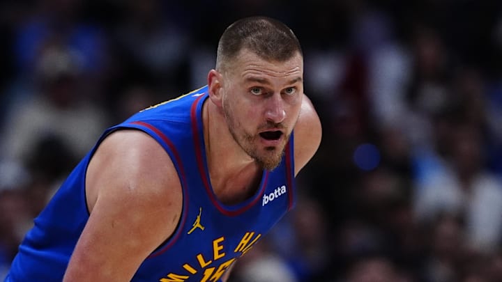 Mar 22, 2026; Denver, Colorado, USA; Denver Nuggets center Nikola Jokic (15) drives to the net in the first quarter against the Portland Trail Blazers at Ball Arena. Mandatory Credit: Ron Chenoy-Imagn Images