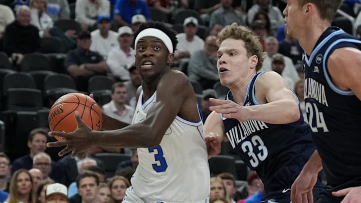 BYU forward AJ Dybantsa drives past Villanova forward Matt Hodge during their season opener.