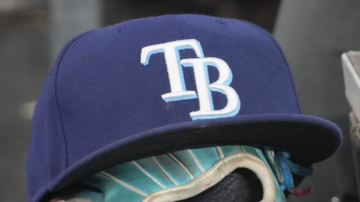 Sep 26, 2025; Toronto, Ontario, CAN; The hat and glove of Tampa Bay Rays third baseman Junior Caminero (13) in the dugout during the game against the Toronto Blue Jays at Rogers Centre. Sep 26, 2025; Toronto, Ontario, CAN; The hat and glove of Tampa Bay Rays third baseman Junior Caminero (13) in the dugout during the game against the Toronto Blue Jays at Rogers Centre.