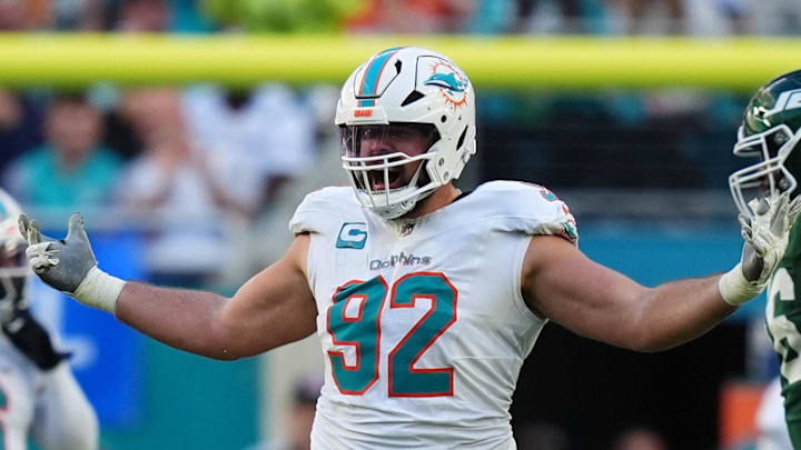 Dec 8, 2024; Miami Gardens, Florida, USA; Miami Dolphins defensive tackle Zach Sieler (92) celebrates after sacking New York Jets quarterback Aaron Rodgers (8, not pictured) during the second half at Hard Rock Stadium. Mandatory Credit: Jasen Vinlove-Imagn Images Dec 8, 2024; Miami Gardens, Florida, USA; Miami Dolphins defensive tackle Zach Sieler (92) celebrates after sacking New York Jets quarterback Aaron Rodgers (8, not pictured) during the second half at Hard Rock Stadium. Mandatory Credit: Jasen Vinlove-Imagn Images