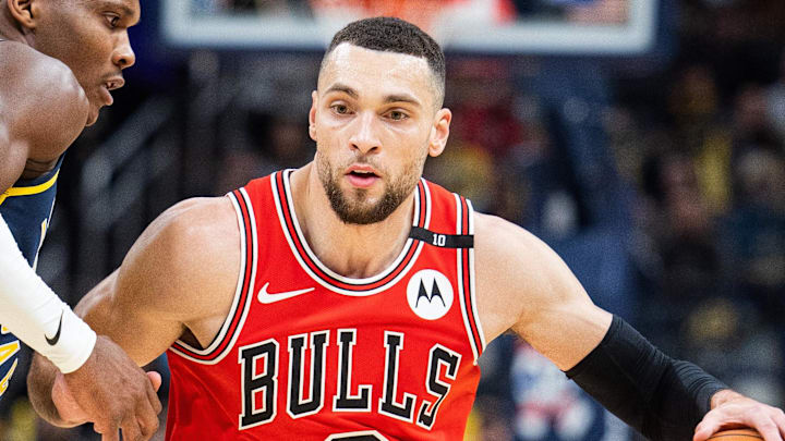 Jan 8, 2025; Indianapolis, Indiana, USA; Chicago Bulls guard Zach LaVine (8) dribbles against Indiana Pacers guard Bennedict Mathurin (00) in the first half at Gainbridge Fieldhouse. Mandatory Credit: Trevor Ruszkowski-Imagn Images Jan 8, 2025; Indianapolis, Indiana, USA; Chicago Bulls guard Zach LaVine (8) dribbles against Indiana Pacers guard Bennedict Mathurin (00) in the first half at Gainbridge Fieldhouse. Mandatory Credit: Trevor Ruszkowski-Imagn Images