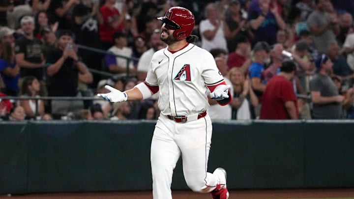 Jul 19, 2025; Phoenix, Arizona, USA; Arizona Diamondbacks third base Eugenio Suarez (28) reacts after hitting a solo home run against the St. Louis Cardinals in the third inning at Chase Field. 