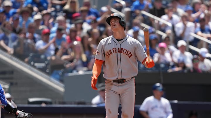Jul 20, 2025; Toronto, Ontario, CAN; San Francisco Giants third baseman Matt Chapman (26) reacts after striking out against the Toronto Blue Jays during the eighth inning at Rogers Centre. 