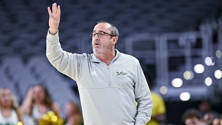 Mar 9, 2022; Fort Worth, TX, USA; South Florida Bulls head coach Jose Fernandez motions to his team during the first half of the American Athletic Conference women's basketball tournament semifinals against the Houston Cougars at Dickies Arena. Mandatory Credit: Jerome Miron-Imagn Images