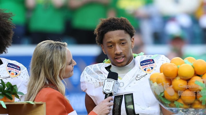 Jan 1, 2026; Miami Gardens, FL, USA; Oregon Ducks defensive back Brandon Finney (4) is interviewed by. ESPN’s Katie George following the 2025 Orange Bowl and quarterfinal game of the College Football Playoff against the Texas Tech Red Raiders at Hard Rock Stadium.
