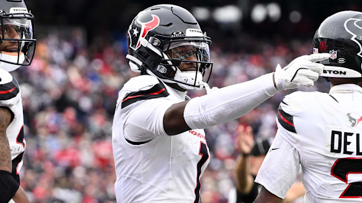 Oct 13, 2024; Foxborough, Massachusetts, USA; Houston Texans wide receiver Stefon Diggs (1) celebrates after scoring a touchdown against the New England Patriots during the second half at Gillette Stadium. Mandatory Credit: Brian Fluharty-Imagn Images Oct 13, 2024; Foxborough, Massachusetts, USA; Houston Texans wide receiver Stefon Diggs (1) celebrates after scoring a touchdown against the New England Patriots during the second half at Gillette Stadium. Mandatory Credit: Brian Fluharty-Imagn Images