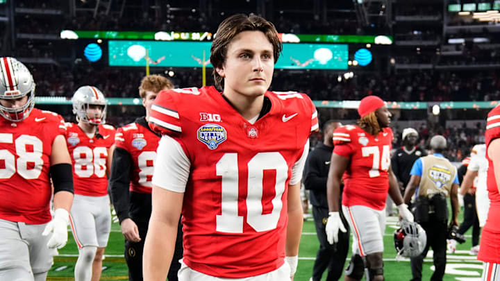 Ohio State Buckeyes quarterback Julian Sayin (10) leaves the field following the Cotton Bowl at AT&T Stadium in Arlington, Texas for the College Football Playoff quarterfinal game against the Miami Hurricanes on Dec. 31, 2025. Ohio State lost 24-14.