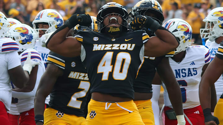 Sep 6, 2025; Columbia, Missouri, USA; Missouri Tigers linebacker Josiah Trotter celebrates a tackle in the first quarter against Kansas.