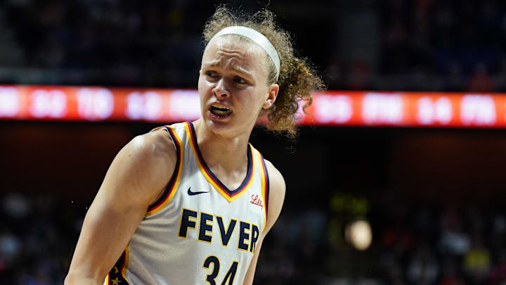 May 14, 2024; Uncasville, Connecticut, USA; Indiana Fever guard Grace Berger (34) reacts after called for a foul as they take on the Connecticut Sun in the second half at Mohegan Sun Arena. Mandatory Credit: David Butler II-Imagn Images