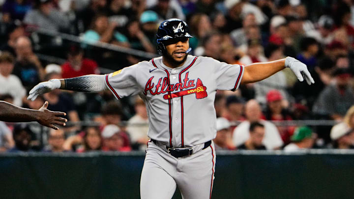 Apr 2, 2026; Phoenix, Arizona, USA; Atlanta Braves designated hitter Dominic Smith (8) celebrates a home run during the third inning against the Arizona Diamondbacks at Chase Field. Mandatory Credit: Arianna Grainey-Imagn Images