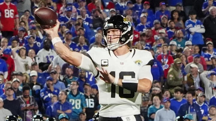 Sep 23, 2024; Orchard Park, New York, USA; Jacksonville Jaguars quarterback Trevor Lawrence (16) throws a touchdown pass against the Buffalo Bills during the second half at Highmark Stadium. Mandatory Credit: Gregory Fisher-Imagn Images