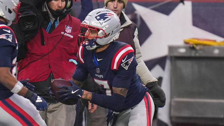 Jan 18, 2026; Foxborough, MA, USA; New England Patriots cornerback Carlton Davis III (7) reacts after intercepting the ball in the second quarter against Houston Texans in an AFC Divisional Round game at Gillette Stadium. Mandatory Credit: David Butler II-Imagn Images