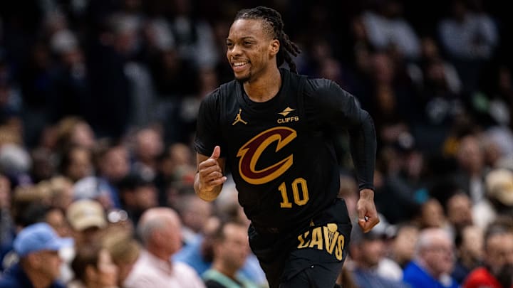 Dec 7, 2024; Charlotte, North Carolina, USA; Cleveland Cavaliers guard Darius Garland (10) reacts after a three point basket against the Charlotte Hornets during the second quarter at Spectrum Center. Mandatory Credit: Scott Kinser-Imagn Images