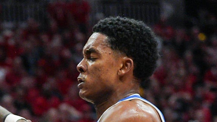 Louisville Cardinals guard Kobe Rodgers (11) and Duke Blue Devils guard Caleb Foster (1) battled for control in the second half as the Blue Devils rallied to beat the Cards 84-73 Tuesday night at KFC Yum Center January 6, 2026. Duke shot 70 percent in field goals in the second half after only 36 percent in the first. Louisville Cardinals guard Kobe Rodgers (11) and Duke Blue Devils guard Caleb Foster (1) battled for control in the second half as the Blue Devils rallied to beat the Cards 84-73 Tuesday night at KFC Yum Center January 6, 2026. Duke shot 70 percent in field goals in the second half after only 36 percent in the first.