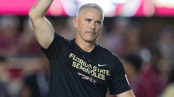 Florida State Seminoles head coach Mike Norvell walks down the field. The Miami Hurricanes lead the Florida State Seminoles 14-3 at the half on Saturday, Oct. 4, 2025.