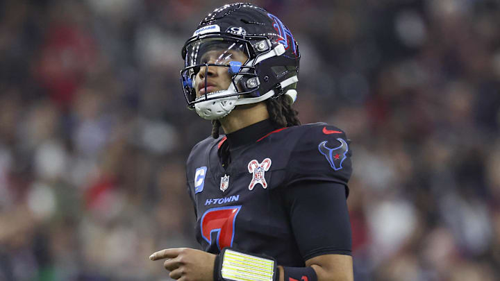 Dec 15, 2024; Houston, Texas, USA; Houston Texans quarterback C.J. Stroud (7) looks up after a play during the second quarter against the Baltimore Ravens at NRG Stadium. Mandatory Credit: Troy Taormina-Imagn Images Dec 15, 2024; Houston, Texas, USA; Houston Texans quarterback C.J. Stroud (7) looks up after a play during the second quarter against the Baltimore Ravens at NRG Stadium. Mandatory Credit: Troy Taormina-Imagn Images