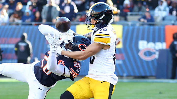 Nov 23, 2025; Chicago, Illinois, USA; Chicago Bears cornerback Nahshon Wright (26) breaks up a pass against Pittsburgh Steelers wide receiver Roman Wilson (10) during the second half at Soldier Field. Mandatory Credit: Mike Dinovo-Imagn Images