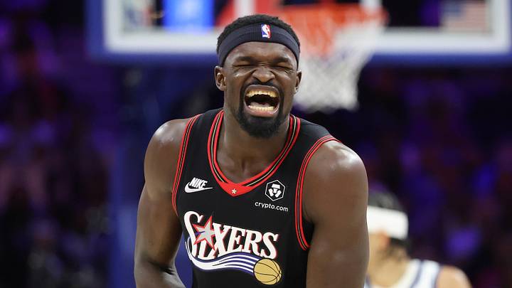 Philadelphia 76ers center Adem Bona (30) reacts after hurting his arm during a play against the Orlando Magic in the fourth quarter of a play-in round of the 2026 NBA Playoffs at Xfinity Mobile Arena on April 15, 2026.