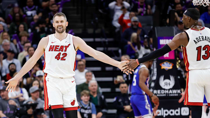 Feb 26, 2024; Sacramento, California, USA; Miami Heat forward Kevin Love (42) celebrates with center Bam Adebayo (13) during the third quarter against the Sacramento Kings at Golden 1 Center. Feb 26, 2024; Sacramento, California, USA; Miami Heat forward Kevin Love (42) celebrates with center Bam Adebayo (13) during the third quarter against the Sacramento Kings at Golden 1 Center.