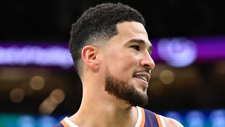 Mar 16, 2026; Boston, Massachusetts, USA; Phoenix Suns guard Devin Booker (1) reacts after a game against the Boston Celtics during the second half at the TD Garden. Mandatory Credit: Brian Fluharty-Imagn Images