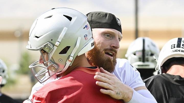 Jun 3, 2026; Henderson, NV, USA; Las Vegas Raiders defensive end Maxx Crosby (98) hugs quarterback Kirk Cousins (8) during organized team activities at Intermountain Health Performance Center. Mandatory Credit: Candice Ward-Imagn Images Jun 3, 2026; Henderson, NV, USA; Las Vegas Raiders defensive end Maxx Crosby (98) hugs quarterback Kirk Cousins (8) during organized team activities at Intermountain Health Performance Center. Mandatory Credit: Candice Ward-Imagn Images