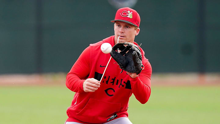 Matt McLain (9) run drills on the field during the first day of full squad workouts