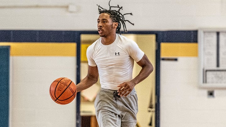 Wayne Memorial's Carlos Medlock Jr. brings the ball up the floor during a boys basketball open gym on Wednesday, July 31, 2024.