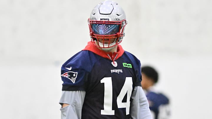  New England Patriots linebacker Robert Spillane (14) before the start of a drill at minicamp held in the WIN Field House at Gillette Stadium.