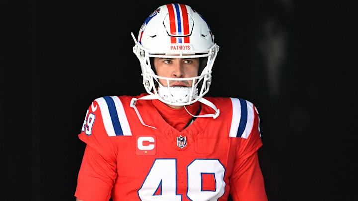 Dec 1, 2024; Foxborough, Massachusetts, USA; New England Patriots long snapper Joe Cardona (49) walks out of the player's tunnel before a game against the Indianapolis Colts at Gillette Stadium. Mandatory Credit: Eric Canha-Imagn Images