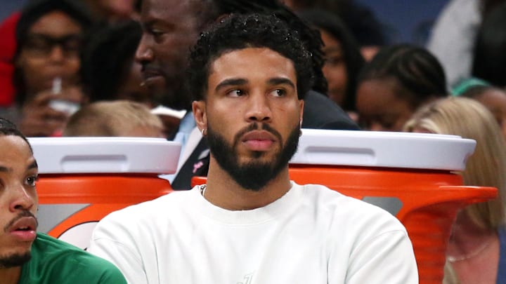 Oct 8, 2025; Memphis, Tennessee, USA; Boston Celtics forward Jayson Tatum (0) looks on from the bench during the second quarter against the Memphis Grizzlies at FedExForum. Mandatory Credit: Petre Thomas-Imagn Images