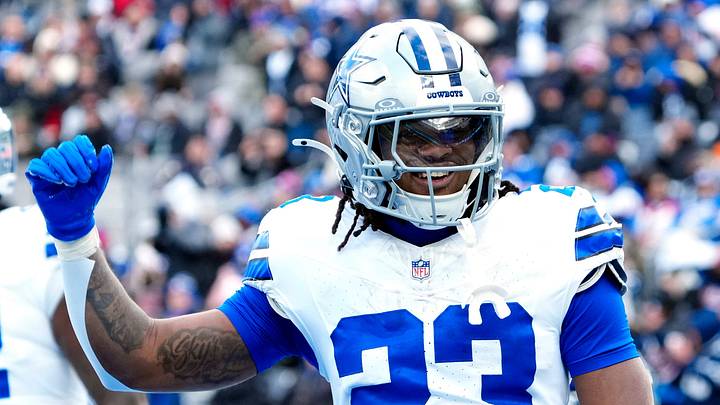 Dallas Cowboys running back Jaydon Blue (23) celebrates after scoring the first touchdown of the game, Sunday, January 4, 2026, in East Rutherford.