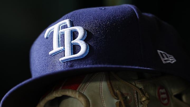 Apr 3, 2023; Washington, District of Columbia, USA; A general view of a Tampa Bay Rays hat and glove during the seventh inning of the game against the Washington Nationals at Nationals Park. Apr 3, 2023; Washington, District of Columbia, USA; A general view of a Tampa Bay Rays hat and glove during the seventh inning of the game against the Washington Nationals at Nationals Park.