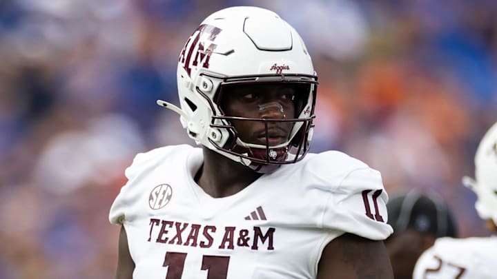 Sep 14, 2024; Gainesville, Florida, USA; Texas A&M Aggies defensive lineman Nic Scourton (11) looks toward the sideline against the Florida Gators during the first half at Ben Hill Griffin Stadium. Mandatory Credit: Matt Pendleton-Imagn Images Sep 14, 2024; Gainesville, Florida, USA; Texas A&M Aggies defensive lineman Nic Scourton (11) looks toward the sideline against the Florida Gators during the first half at Ben Hill Griffin Stadium. Mandatory Credit: Matt Pendleton-Imagn Images