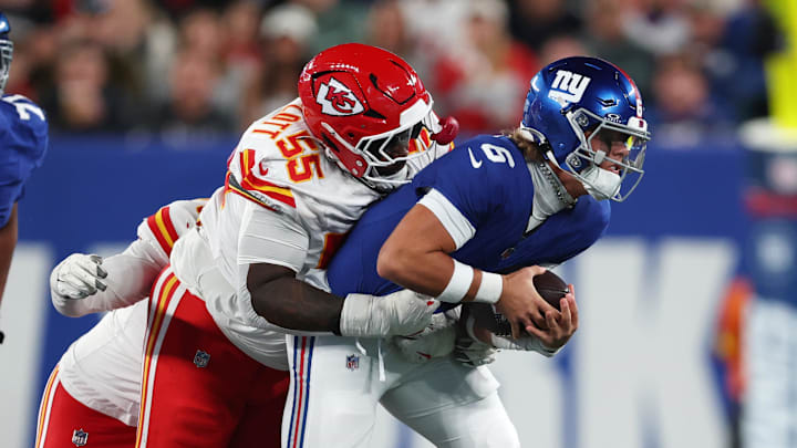 Sep 21, 2025; East Rutherford, New Jersey, USA; New York Giants quarterback Jaxson Dart (6) runs against Kansas City Chiefs defensive tackle Omarr Norman-Lott (55) in the third quarter at MetLife Stadium. Mandatory Credit: Vincent Carchietta-Imagn Images