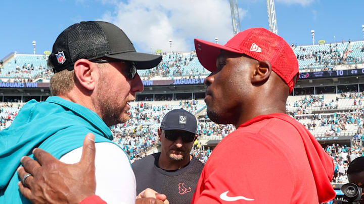Sep 21, 2025; Jacksonville, Florida, USA; Jacksonville Jaguars head coach Liam Coen and Houston Texans head coach DeMeco Ryans shake hands after the game at EverBank Stadium. Mandatory Credit: Morgan Tencza-Imagn Images