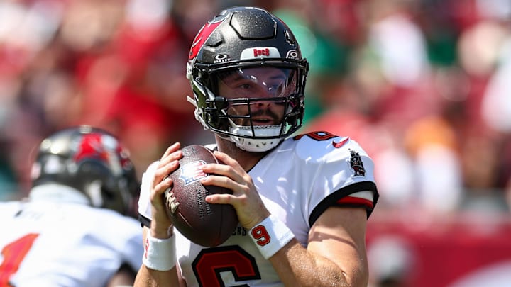 Sep 29, 2024; Tampa, Florida, USA; Tampa Bay Buccaneers quarterback Baker Mayfield (6) drops back to pass against the Philadelphia Eagles in the first quarter at Raymond James Stadium. Mandatory Credit: Nathan Ray Seebeck-Imagn Images Sep 29, 2024; Tampa, Florida, USA; Tampa Bay Buccaneers quarterback Baker Mayfield (6) drops back to pass against the Philadelphia Eagles in the first quarter at Raymond James Stadium. Mandatory Credit: Nathan Ray Seebeck-Imagn Images