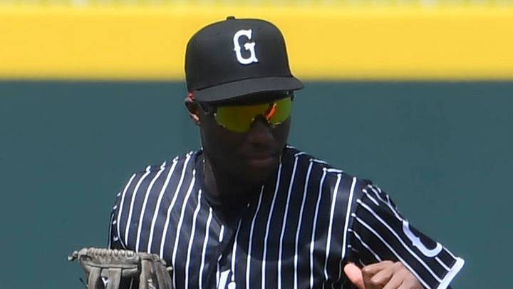 Greenville Drive outfielder Nelly Taylor (1) celebrates with Greenville Drive outfielder Yophery Rodriguez (7).
