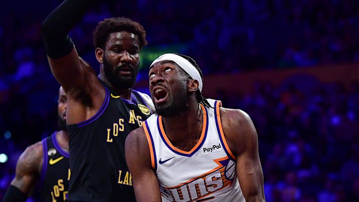 Phoenix Suns center Mark Williams moves to the basket against Los Angeles Lakers center Deandre Ayton during the first half at Crypto.com Arena.