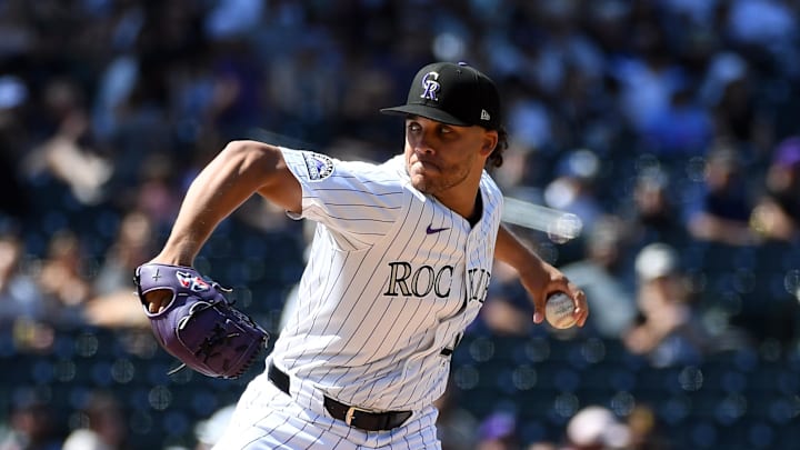 Sep 7, 2025; Denver, Colorado, USA; Colorado Rockies pitcher Luis Peralta (41) pitches during the fourth inning against the San Diego Padres at Coors Field. Mandatory Credit: Christopher Hanewinckel-Imagn Images