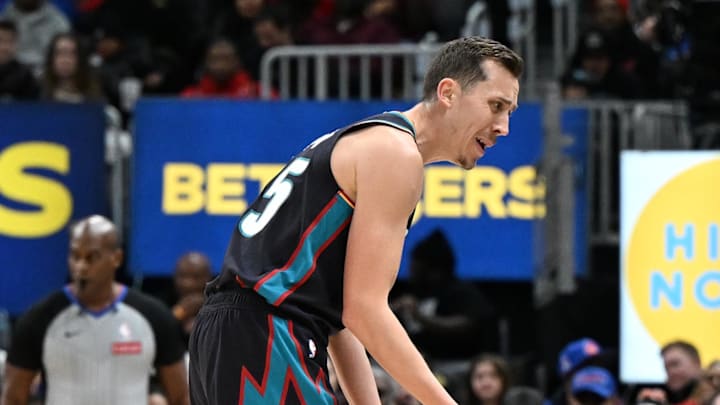 Jan 1, 2026; Detroit, Michigan, USA; Detroit Pistons forward Duncan Robinson (55) argues with referee Curtis Blair (74) after being called for a foul against the Miami Heat in the first quarter at Little Caesars Arena. Mandatory Credit: Lon Horwedel-Imagn Images
