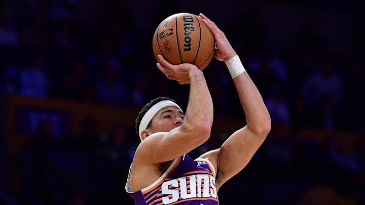 Dec 1, 2025; Los Angeles, California, USA; Phoenix Suns guard Devin Booker (1) shoots against the Los Angeles Lakers during the first half at Crypto.com Arena. Mandatory Credit: Gary A. Vasquez-Imagn Images Dec 1, 2025; Los Angeles, California, USA; Phoenix Suns guard Devin Booker (1) shoots against the Los Angeles Lakers during the first half at Crypto.com Arena. Mandatory Credit: Gary A. Vasquez-Imagn Images