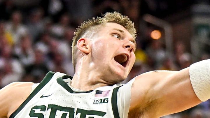 Michigan State's Jaxon Kohler grabs a rebound against Michigan during the first half on Friday, Jan. 30, 2026, at the Breslin Center in East Lansing.