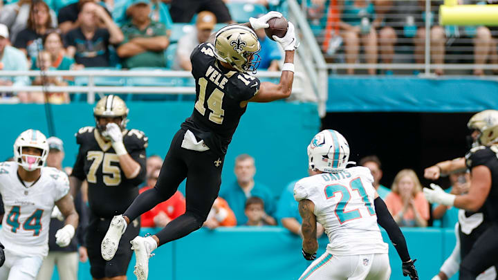 New Orleans Saints WR Devaughn Vele (14) catches a pass against the Miami Dolphins on Nov. 30, 2025. New Orleans Saints WR Devaughn Vele (14) catches a pass against the Miami Dolphins on Nov. 30, 2025.